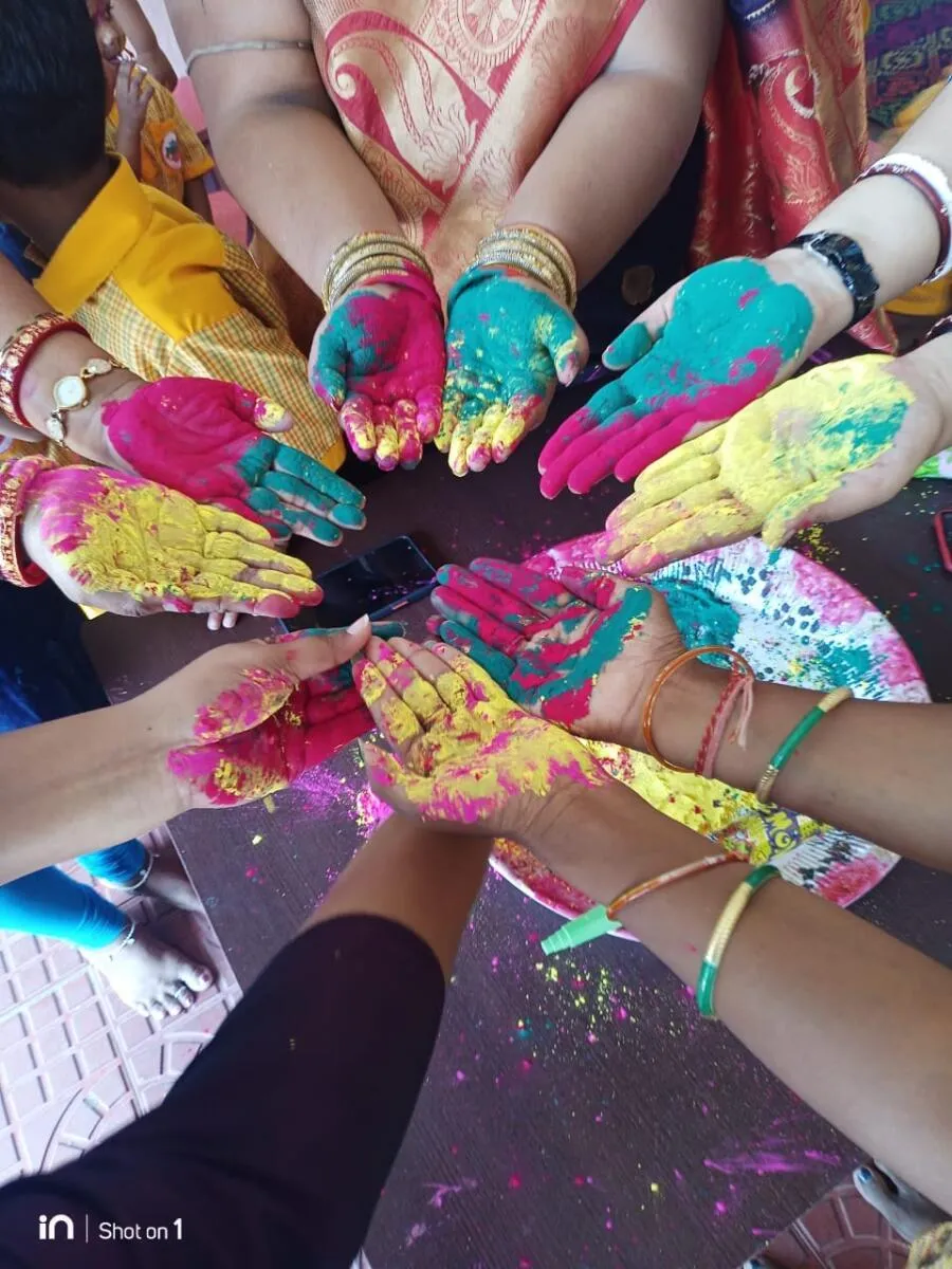 Colourful hands during Holi