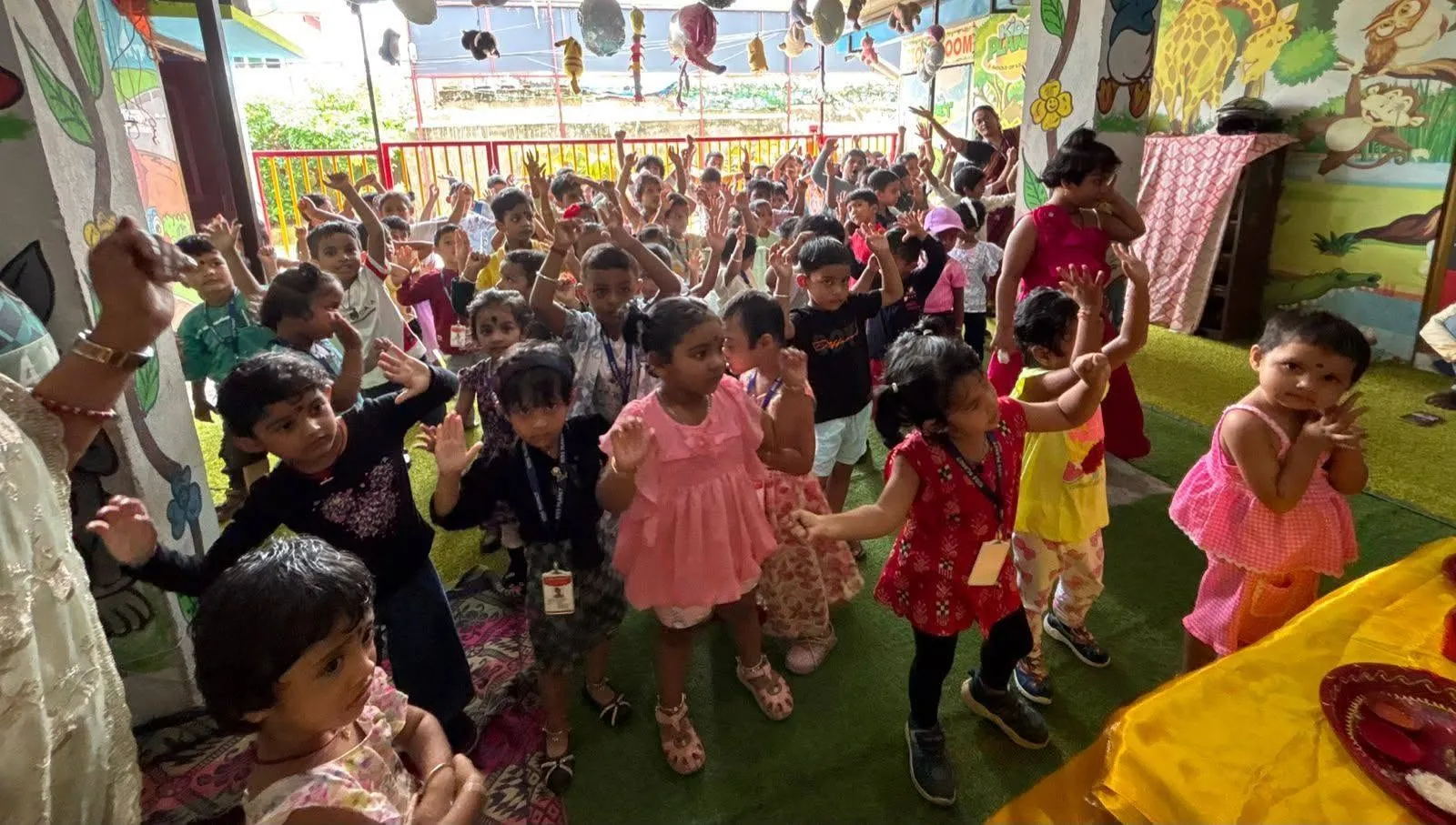 Children and teachers taking part in outdoor activities